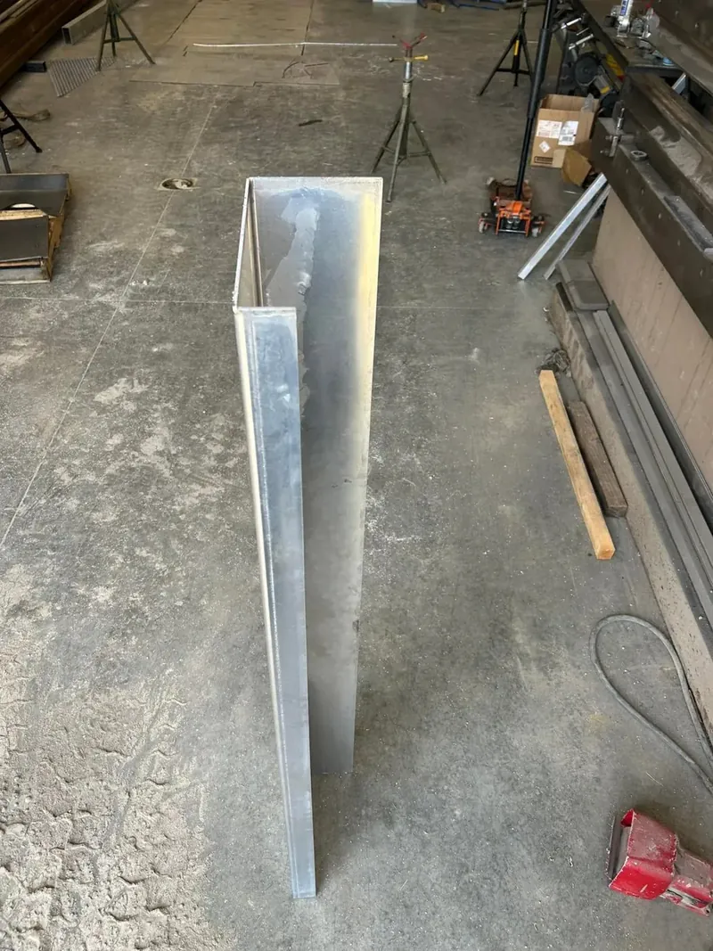 Custom fabricated aluminum piece in the shop